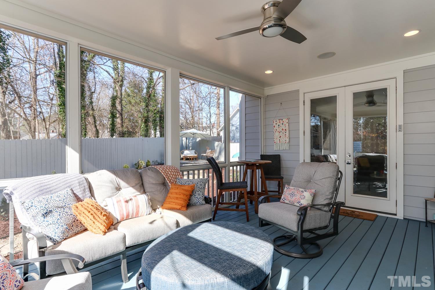107 Revival Way Raleigh, NC 27608 - Photo 25 of 31 a living room with furniture and a large window