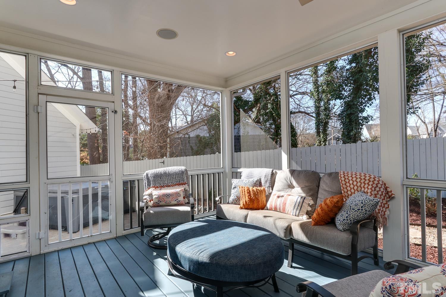 107 Revival Way Raleigh, NC 27608 - Photo 26 of 31 a living room with furniture and a large window