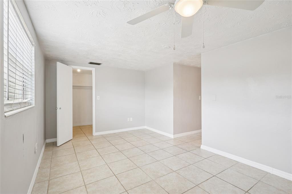 3548 Darlington Road Holiday, FL 34691 - Photo 17 of 32 an empty room with windows