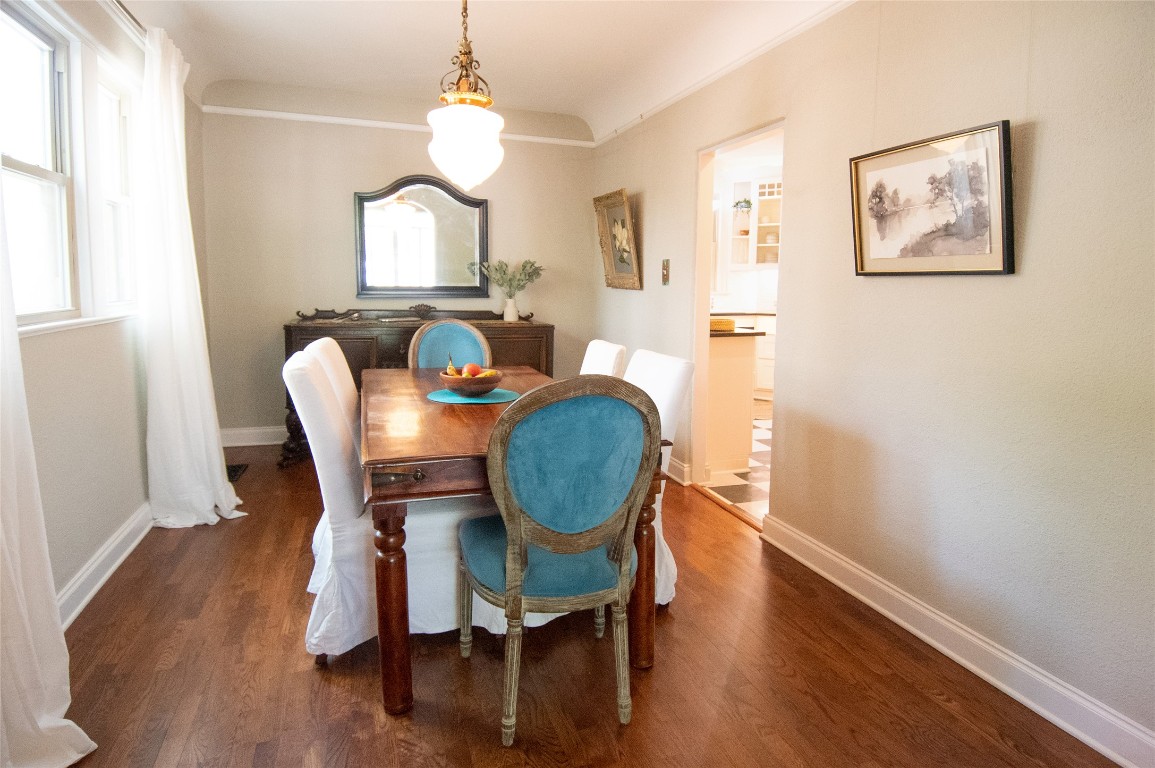 1512 Northwood Road Austin, TX 78703 - Photo 13 of 24 Dining space featuring dark wood finished floors and baseboards