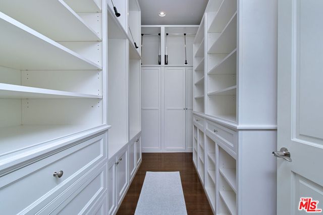 a bedroom with furniture and a couch