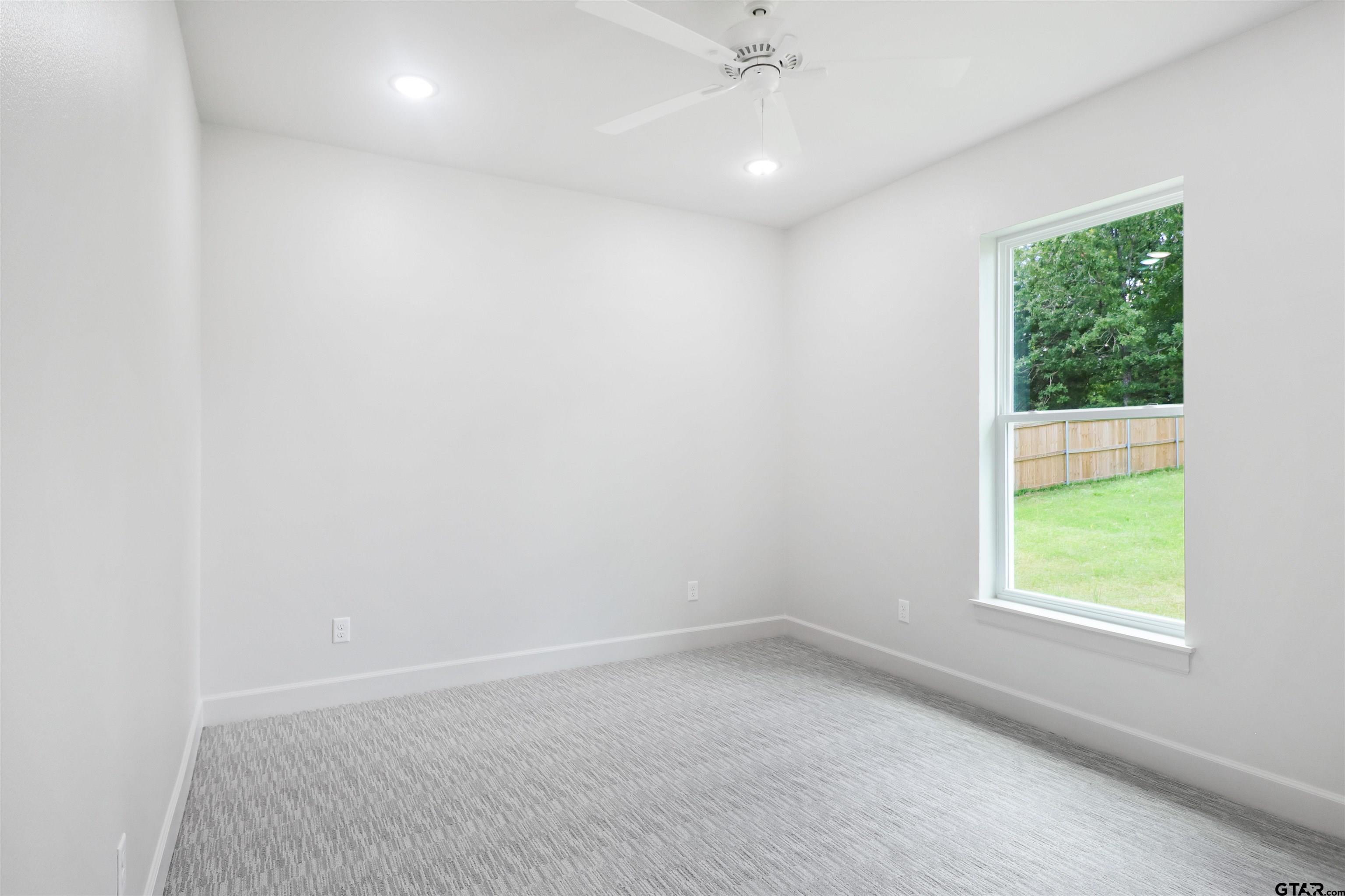 15515 Sugar Ridge Lane Flint, TX 75762 - Photo 27 of 34 an empty room with a window