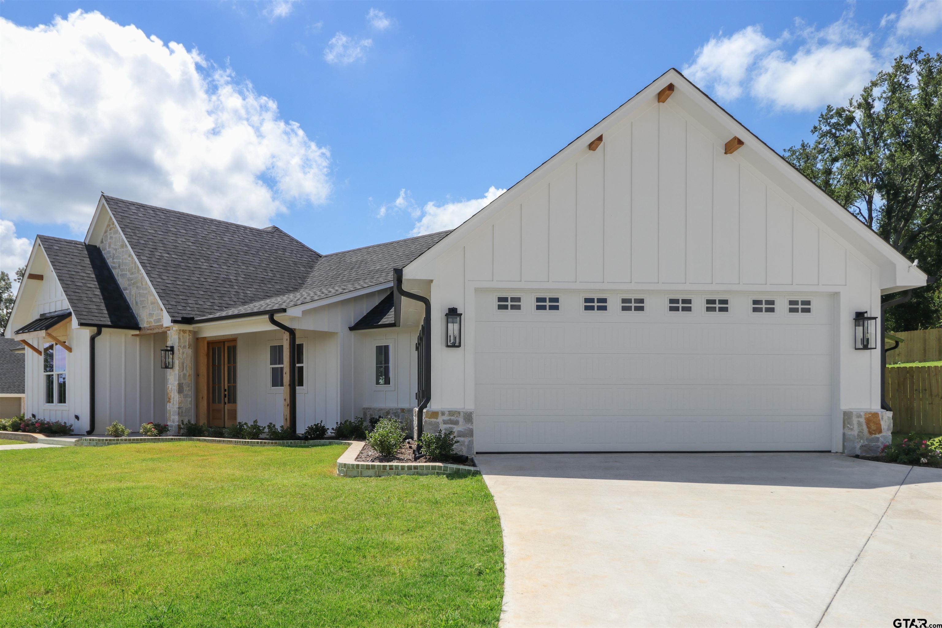 15515 Sugar Ridge Lane Flint, TX 75762 - Photo 3 of 34 a view of a white house with a yard