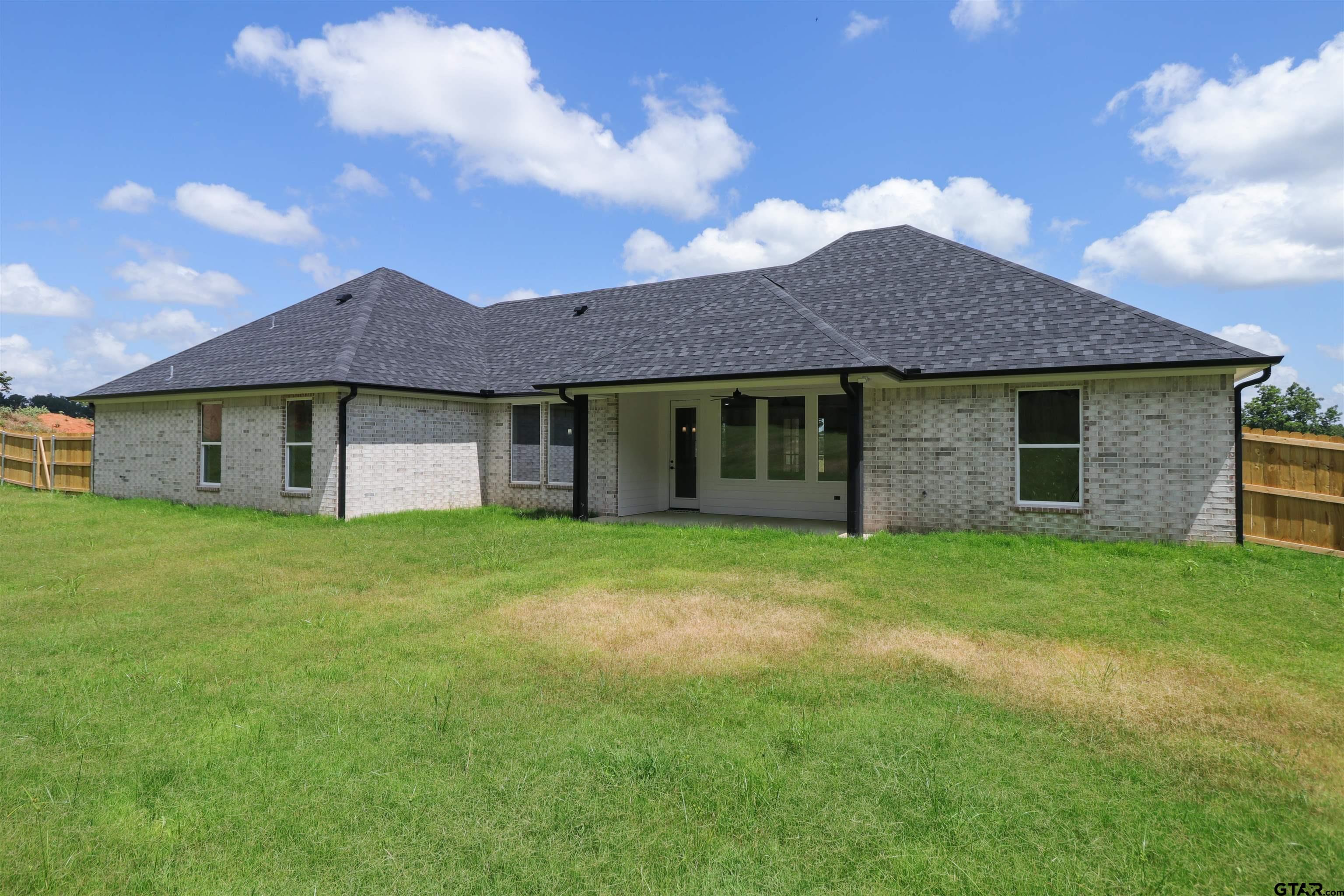15515 Sugar Ridge Lane Flint, TX 75762 - Photo 34 of 34 a view of a house with a yard