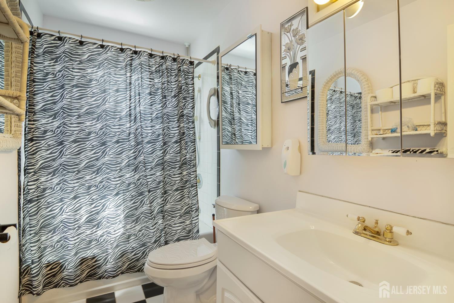 118 Wilton Avenue Middlesex, NJ 08846 - Photo 15 of 24 a bathroom with a sink toilet and shower