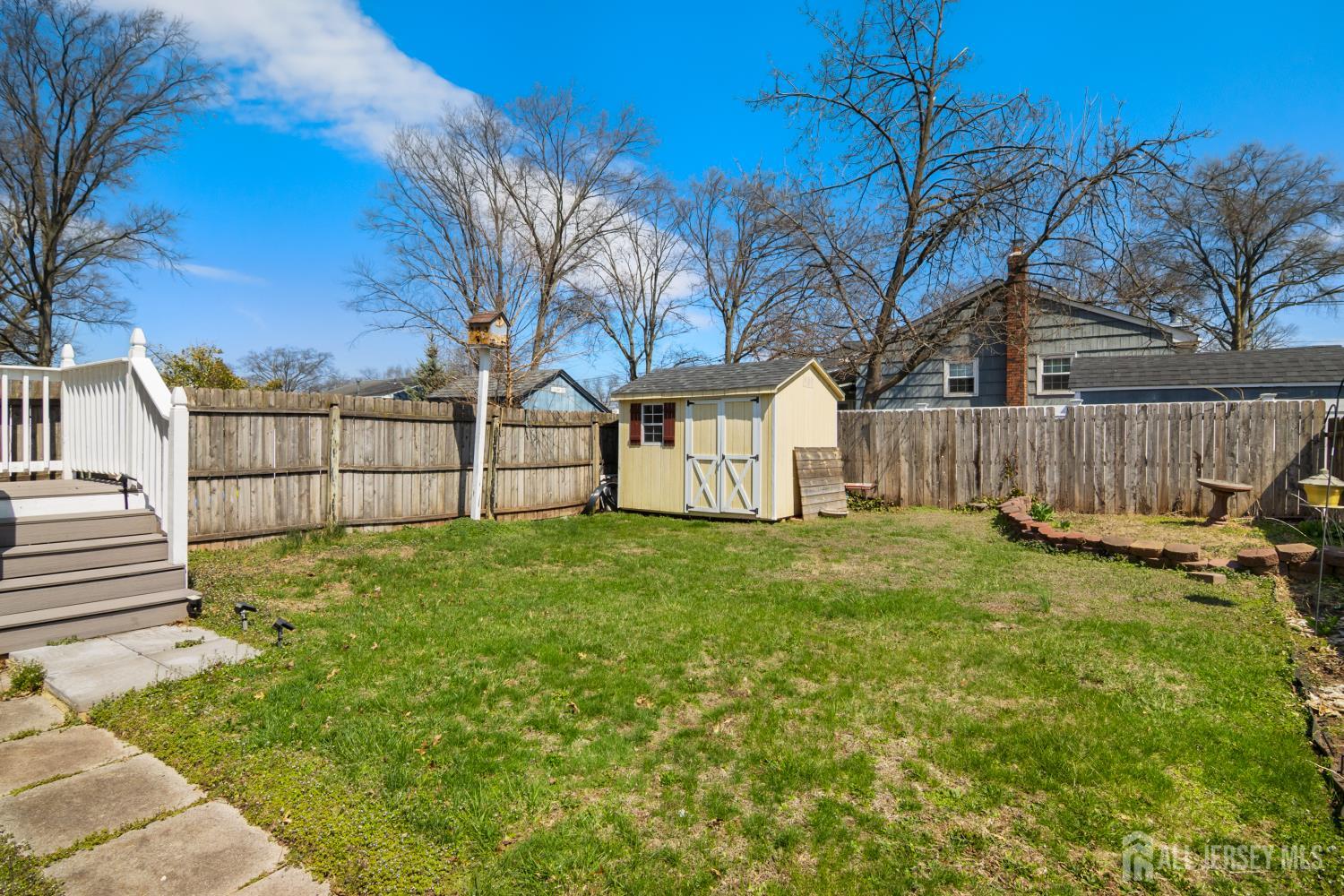 118 Wilton Avenue Middlesex, NJ 08846 - Photo 17 of 24 a view of a backyard with a garden
