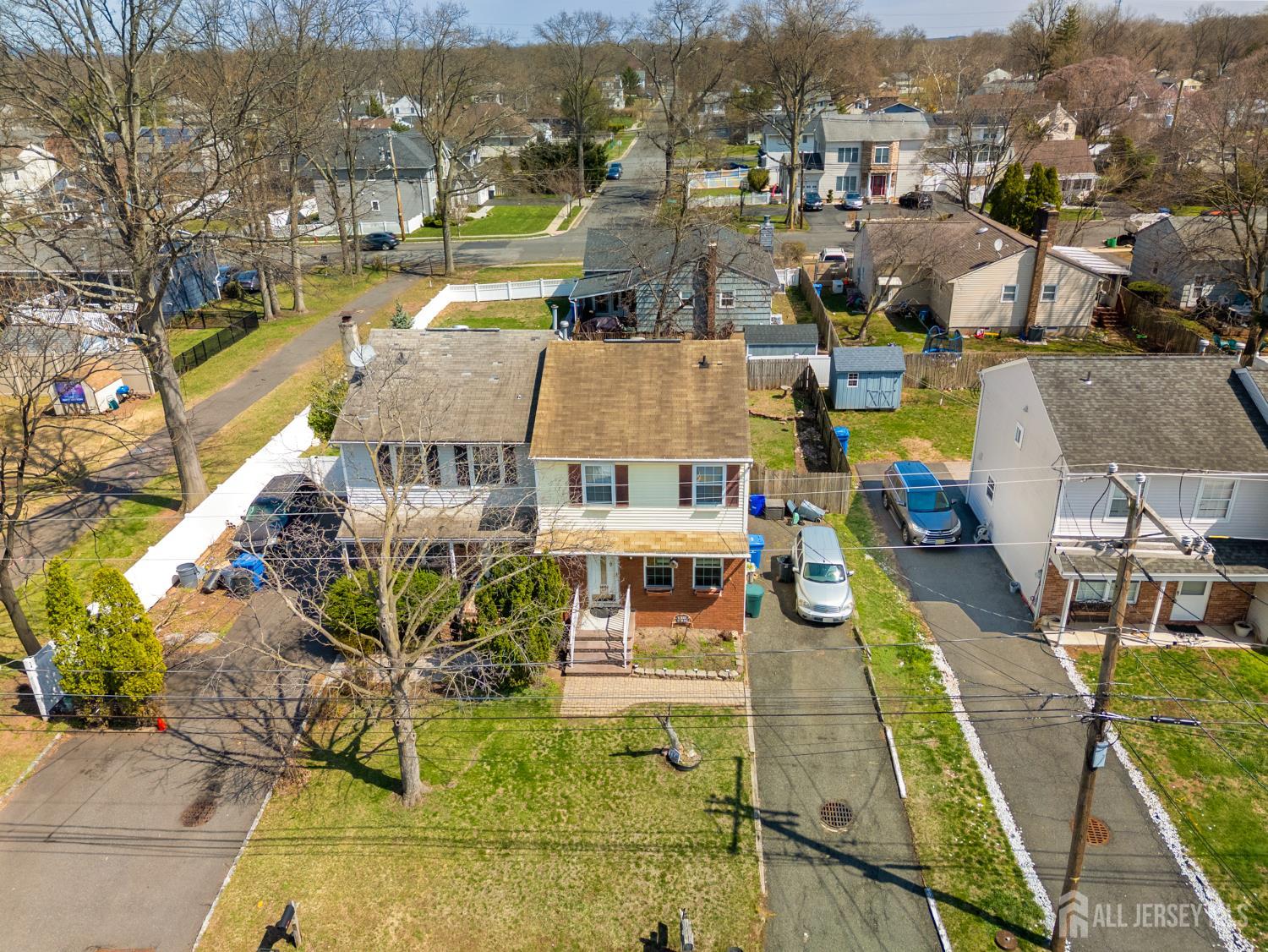 118 Wilton Avenue Middlesex, NJ 08846 - Photo 3 of 24 a view of a city with tall buildings
