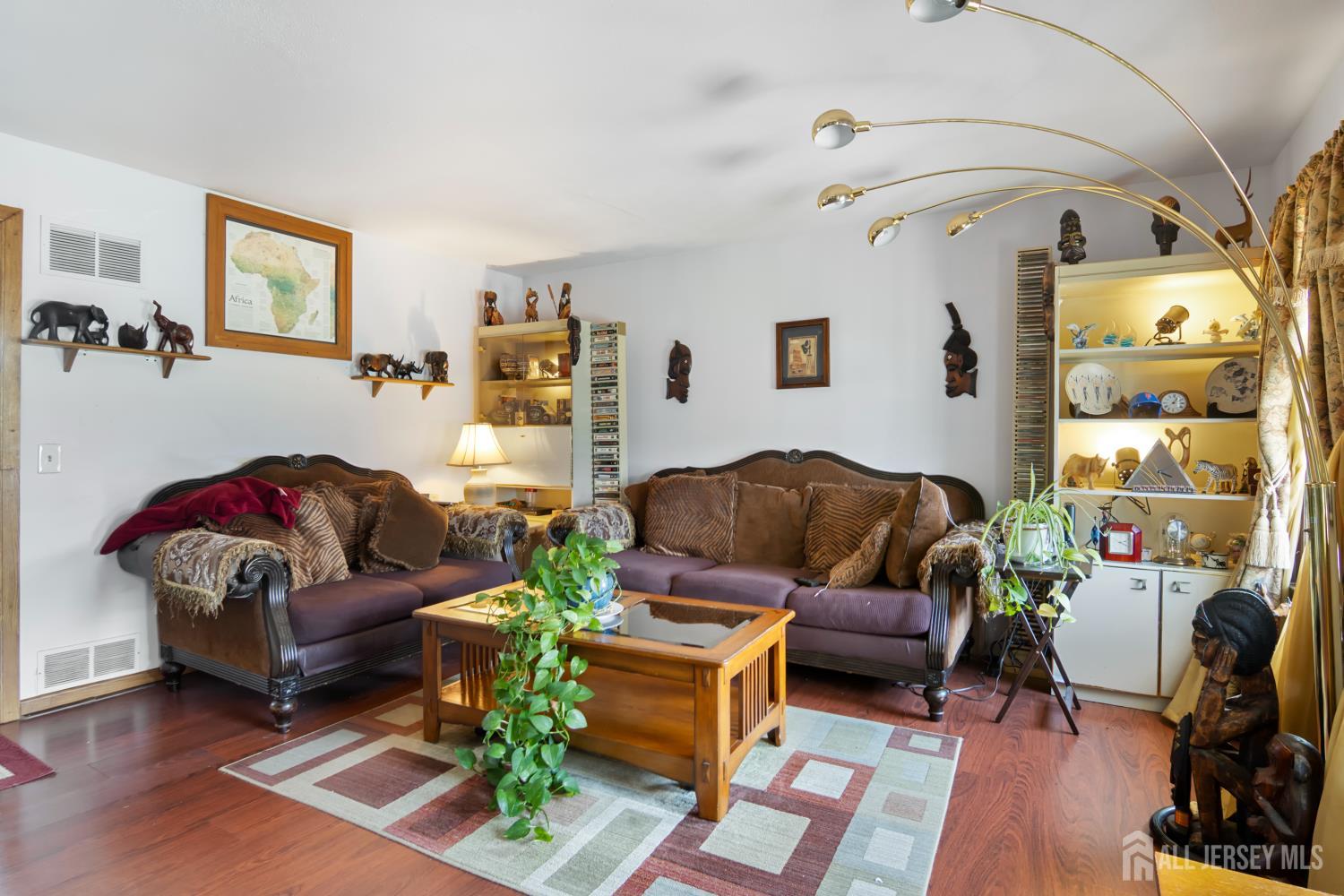 118 Wilton Avenue Middlesex, NJ 08846 - Photo 5 of 24 a living room with furniture and a flat screen tv