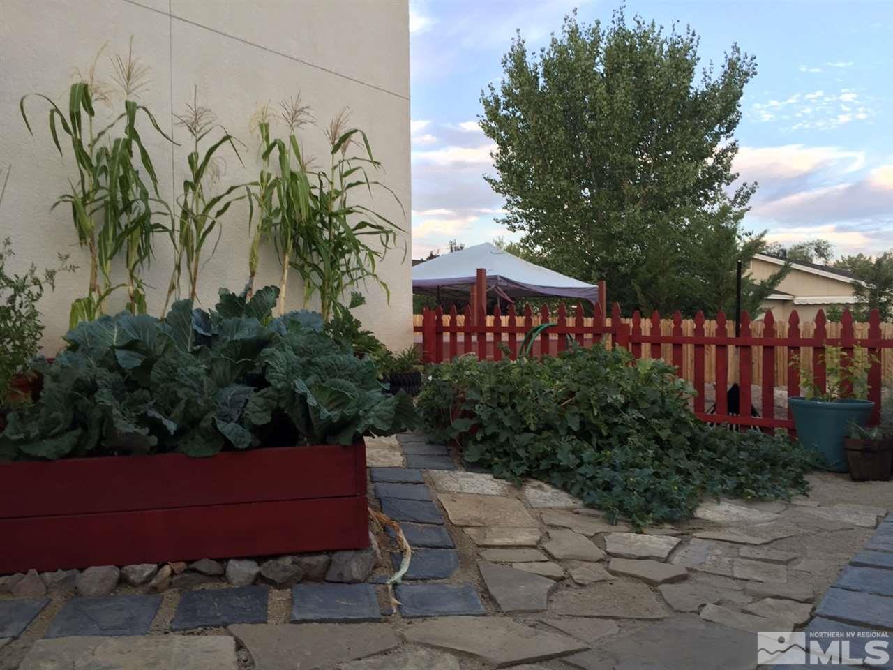 2880 Bryan Street Reno, NV 89503 - Photo 18 of 20 a wooden bench sitting in front of a building