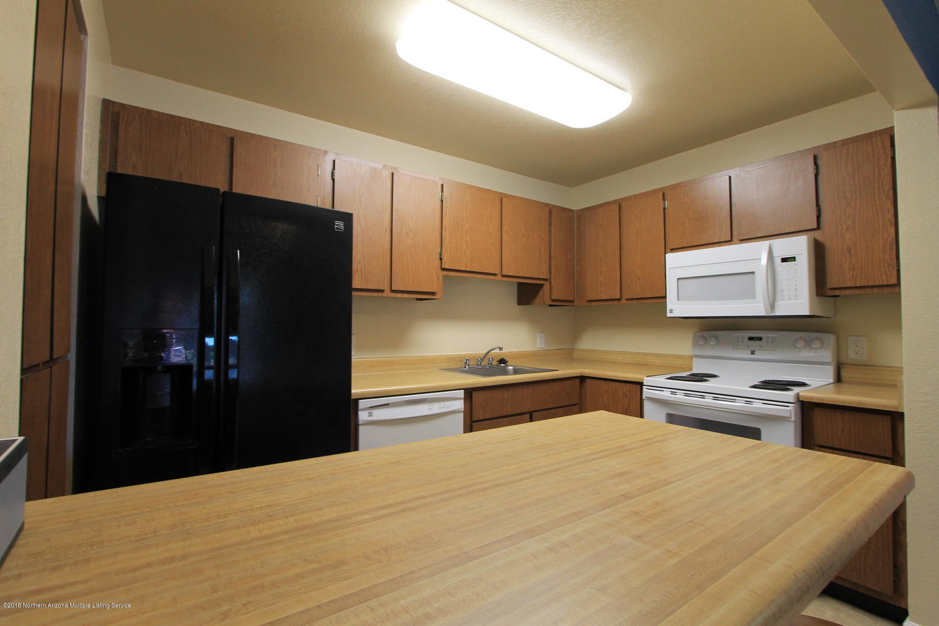 1200 South Riordan Ranch Street, Unit 54 Flagstaff, AZ 86001 - Photo 10 of 22 Kitchen w/ Peninsula