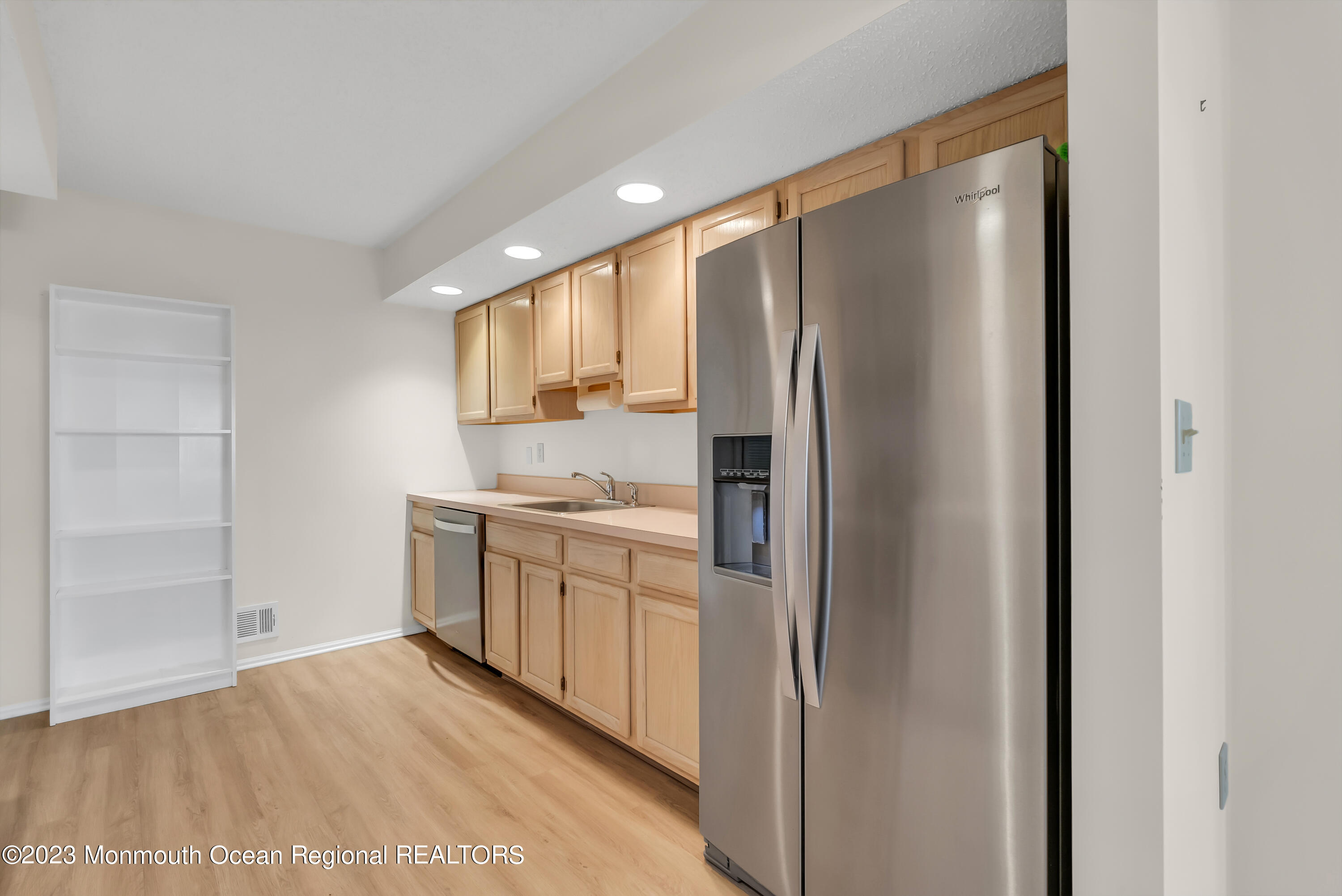 25 Cottontail Drive Brick, NJ 08724 - Photo 12 of 32 a kitchen with stainless steel appliances a refrigerator and a sink