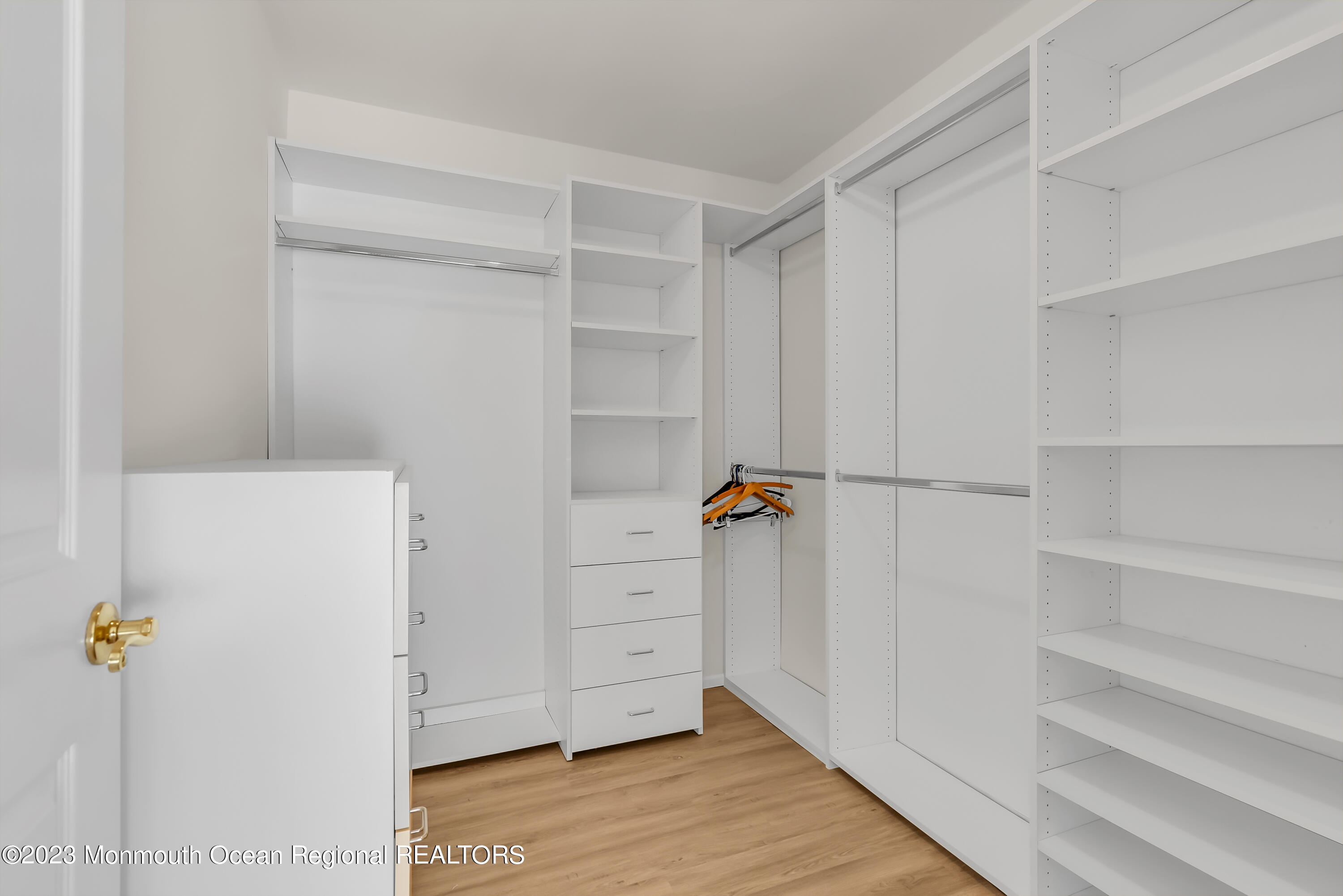 25 Cottontail Drive Brick, NJ 08724 - Photo 19 of 32 a view of walk in closet with empty racks