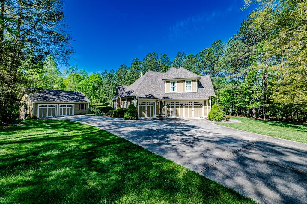 225 Henrys Ridge Road Pittsboro, NC 27312 - Photo 52 of 67 Bring your boats, cars & hobbies because there is plenty of space waiting for you! 3-bay attached garage & 2-bay detached garage/workshop/pool house.