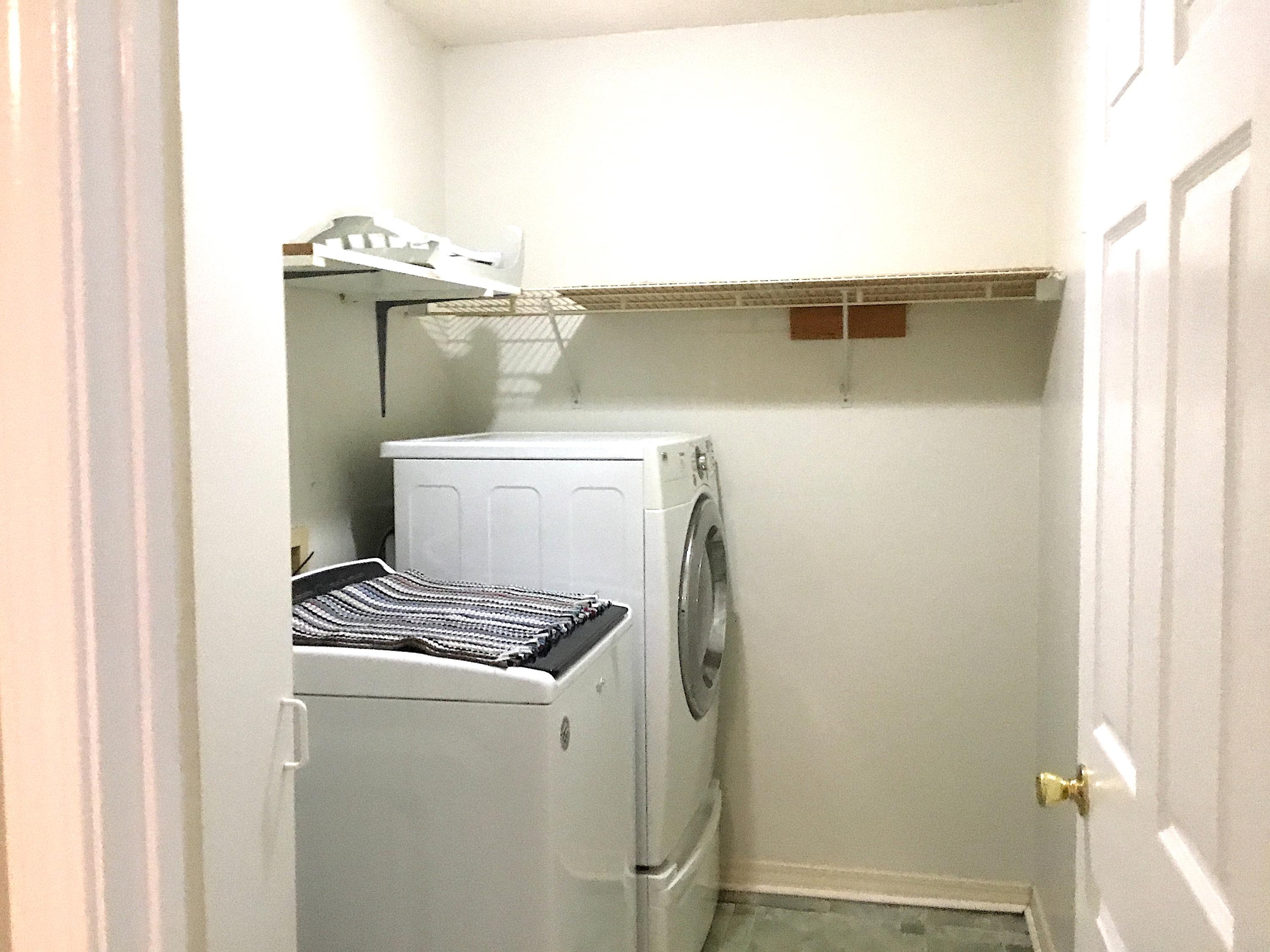 2733 Augustus Road Navarre, FL 32566 - Photo 17 of 36 a bathroom with a toilet and a shower