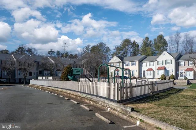 a view of a wrought iron fences in front of house