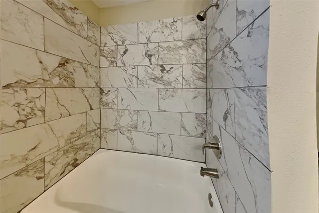 a bathroom with a bathtub