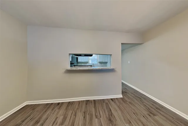 a view of small space with wooden floor