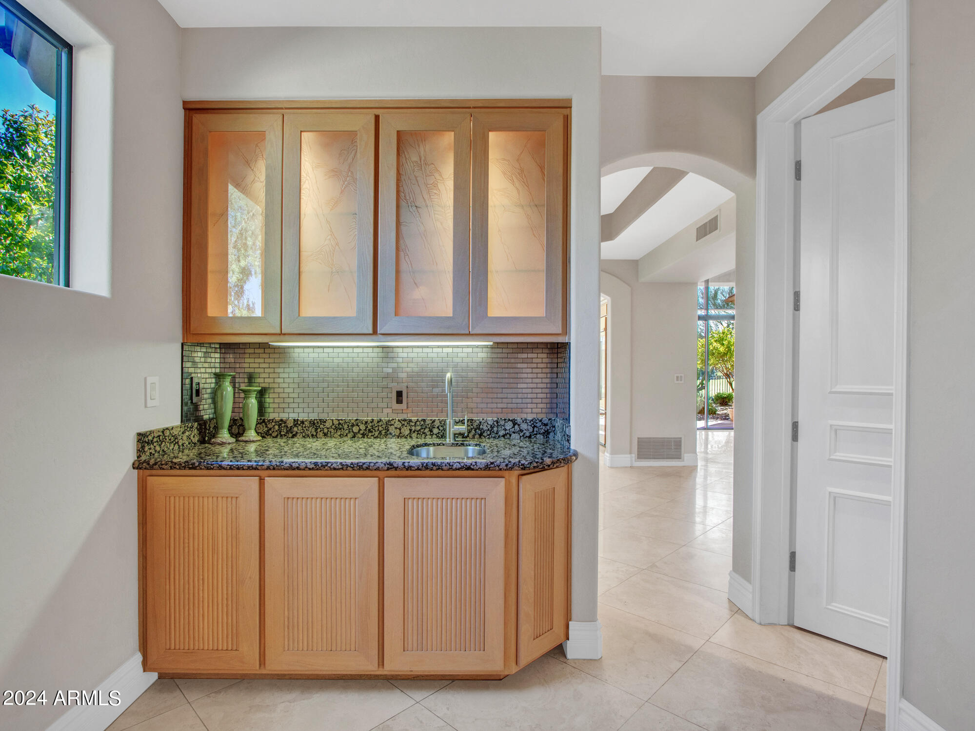 7375 East Gainey Ranch Road, Unit 2 Scottsdale, AZ 85258 - Photo 46 of 79 FR Wet Bar w/ 1/2 bath on right