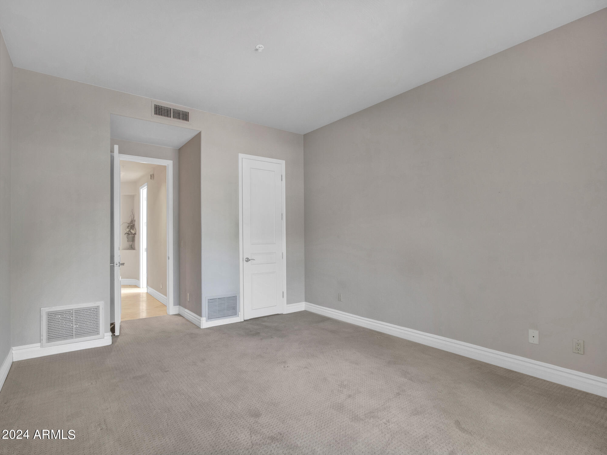 7375 East Gainey Ranch Road, Unit 2 Scottsdale, AZ 85258 - Photo 65 of 79 Bedroom 3 w/ walk-in Closet