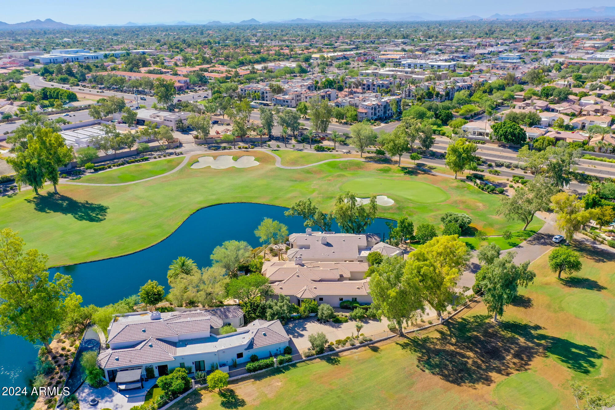 7375 East Gainey Ranch Road, Unit 2 Scottsdale, AZ 85258 - Photo 74 of 79 7375-E-Gainey-Ranch-Rd-#2_04-Back_Drone