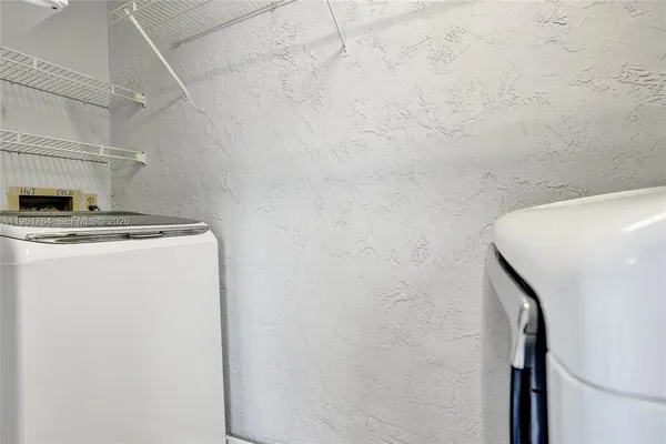 a front view of a house with glass windows