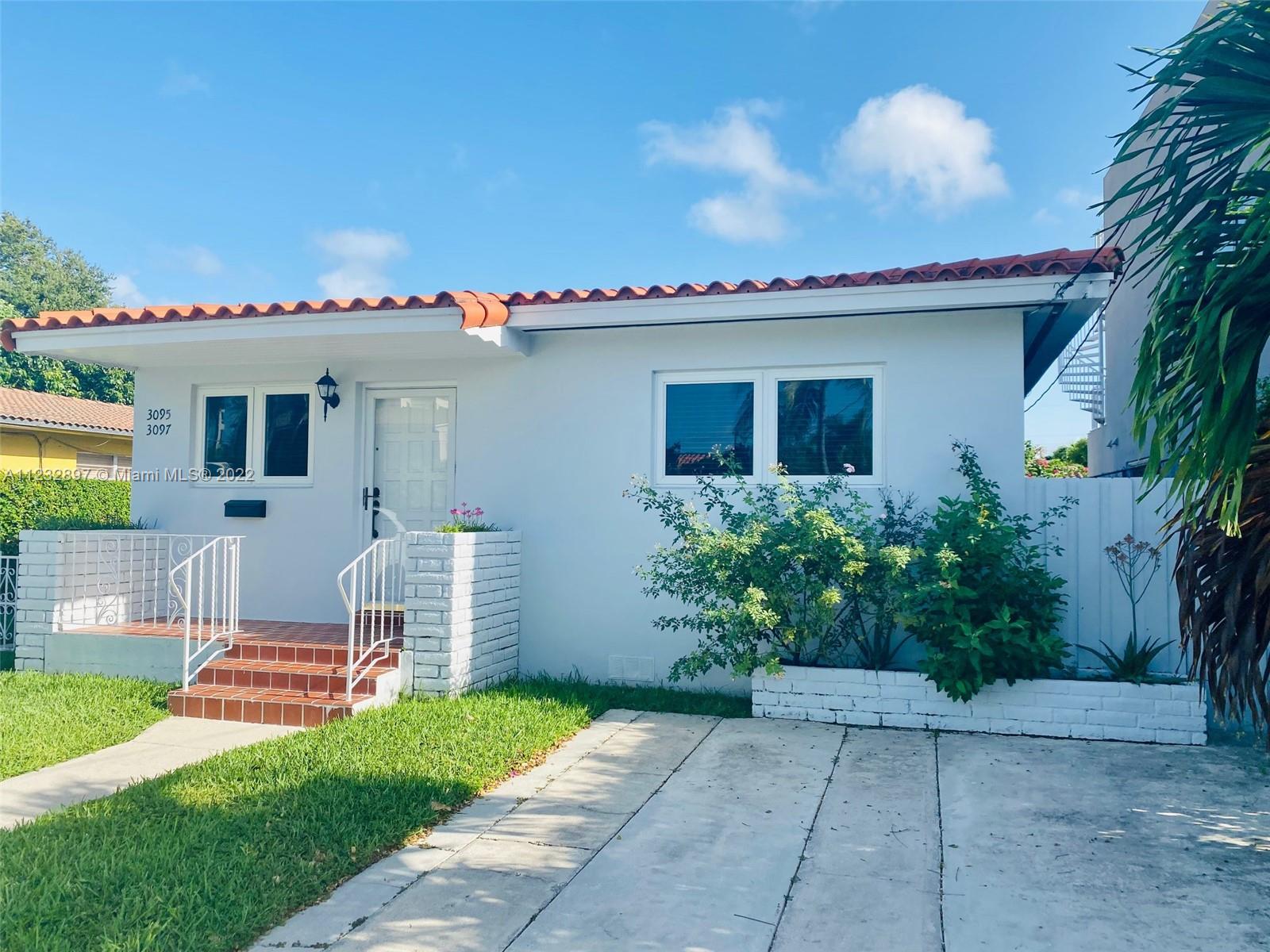 3095 Southwest 21st Street, Unit 1 Miami, FL 33145 - Photo 13 of 15 a view of house with outdoor space and entertaining space