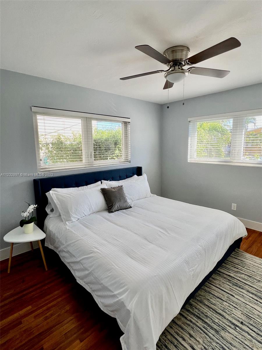 3095 Southwest 21st Street, Unit 1 Miami, FL 33145 - Photo 8 of 15 a bedroom with bed and window