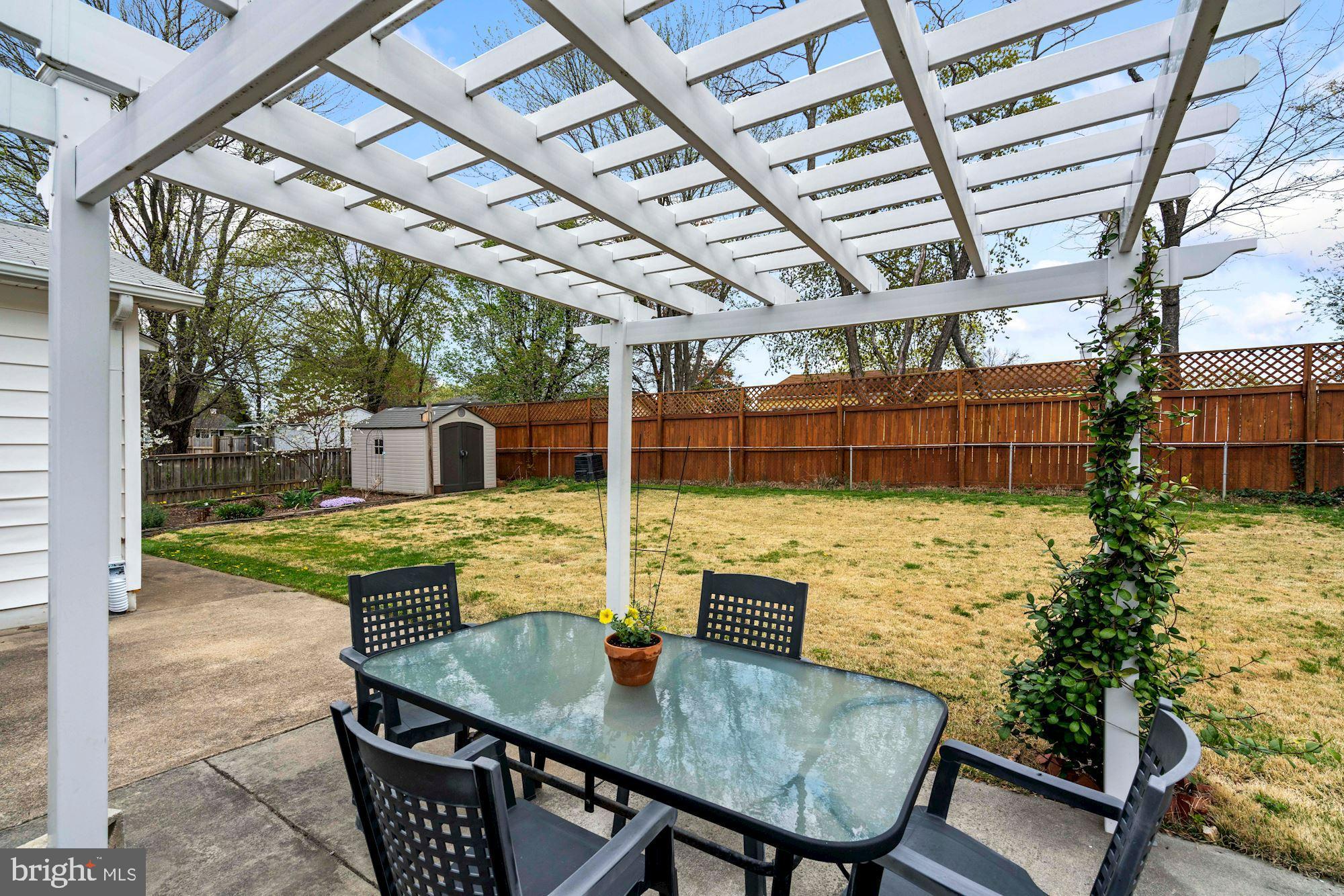 6111 Pinto Place Springfield, VA 22150 - Photo 34 of 35 Enjoy al fresco dining under the pergola.
