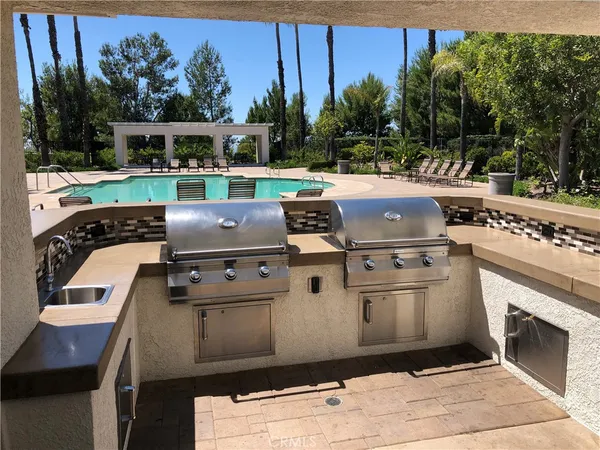 a view of a chairs and table in the terrace