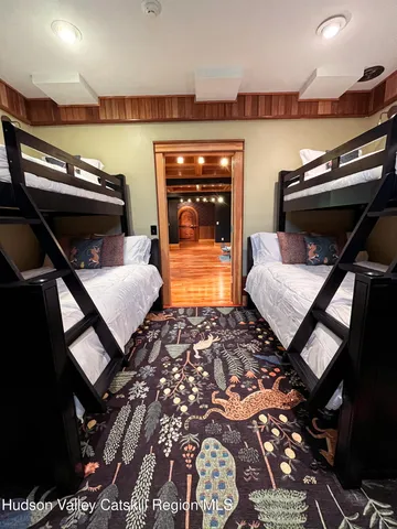 a view of swimming pool with sitting area and furniture