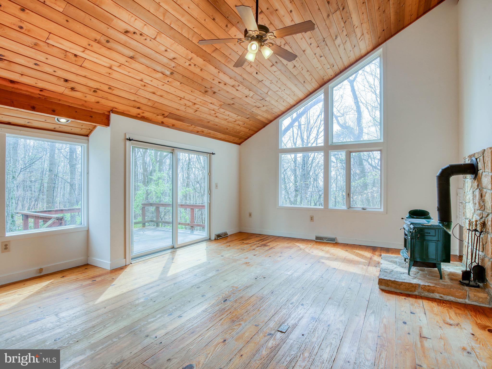 183 John Brown Farm Road Harpers Ferry, WV 25425 - Photo 3 of 41 Open sunny family rm w/hardwood flrs & wood stove