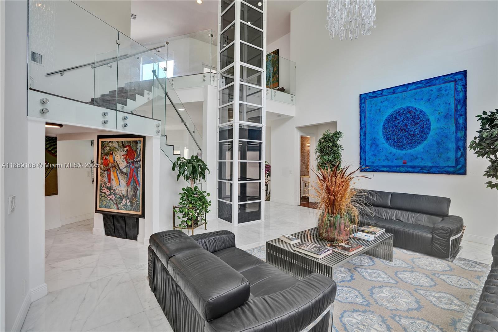 2691 Southwest 139th Terrace Davie, FL 33330 - Photo 14 of 55 a living room with furniture and a fireplace