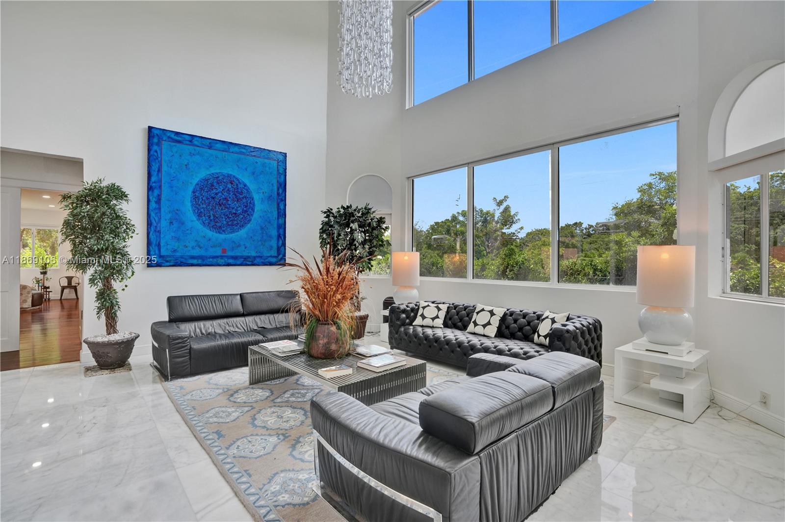 2691 Southwest 139th Terrace Davie, FL 33330 - Photo 17 of 55 a living room with furniture and a large window