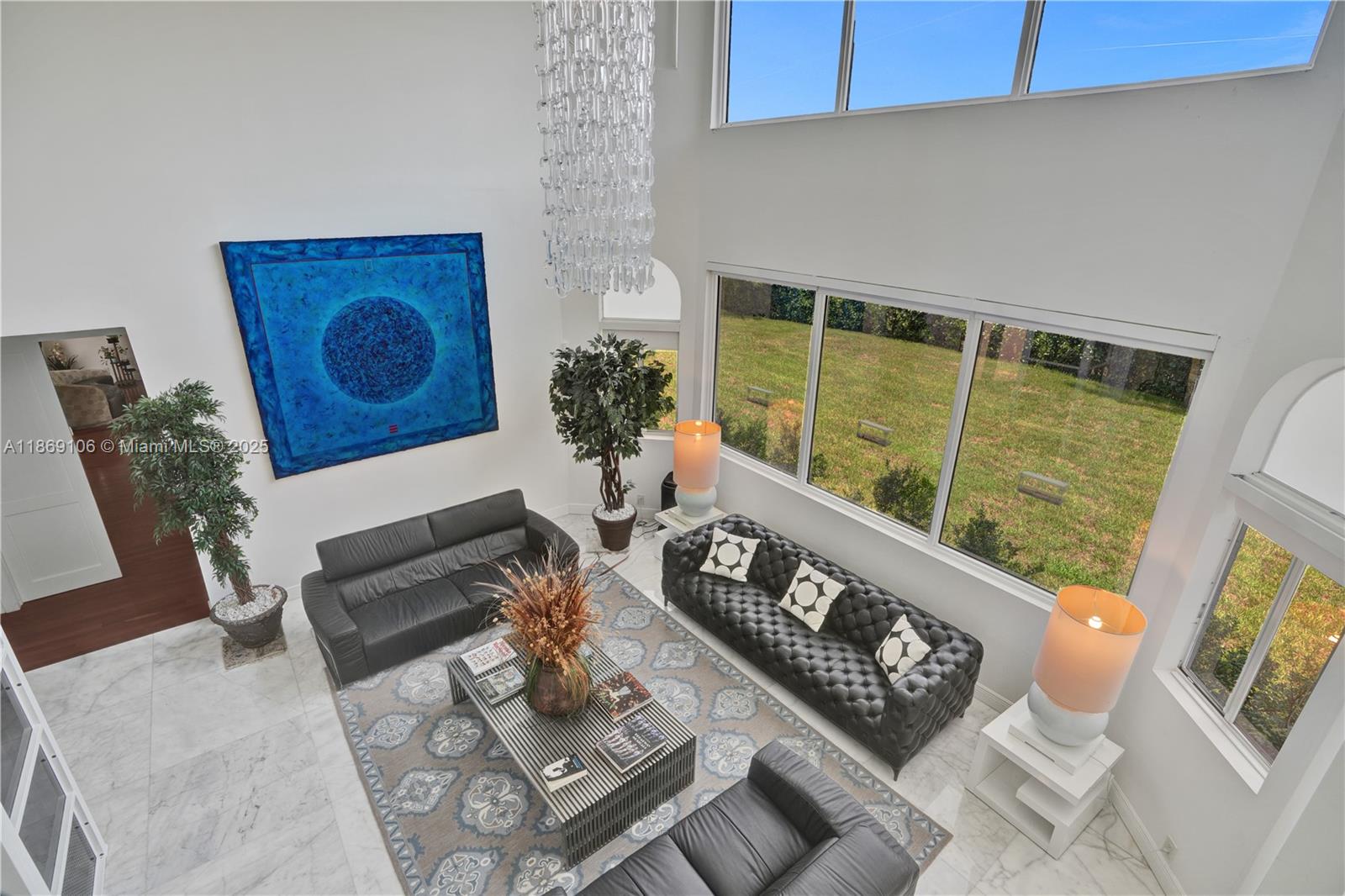 2691 Southwest 139th Terrace Davie, FL 33330 - Photo 19 of 55 view of living room with furniture and a large window