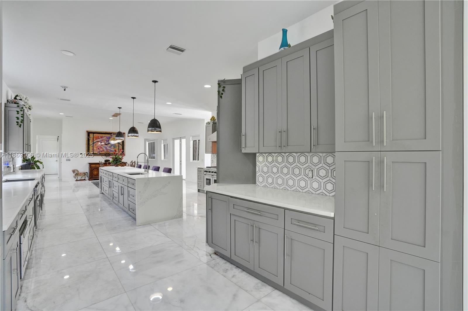 2691 Southwest 139th Terrace Davie, FL 33330 - Photo 24 of 55 a large white kitchen with cabinets