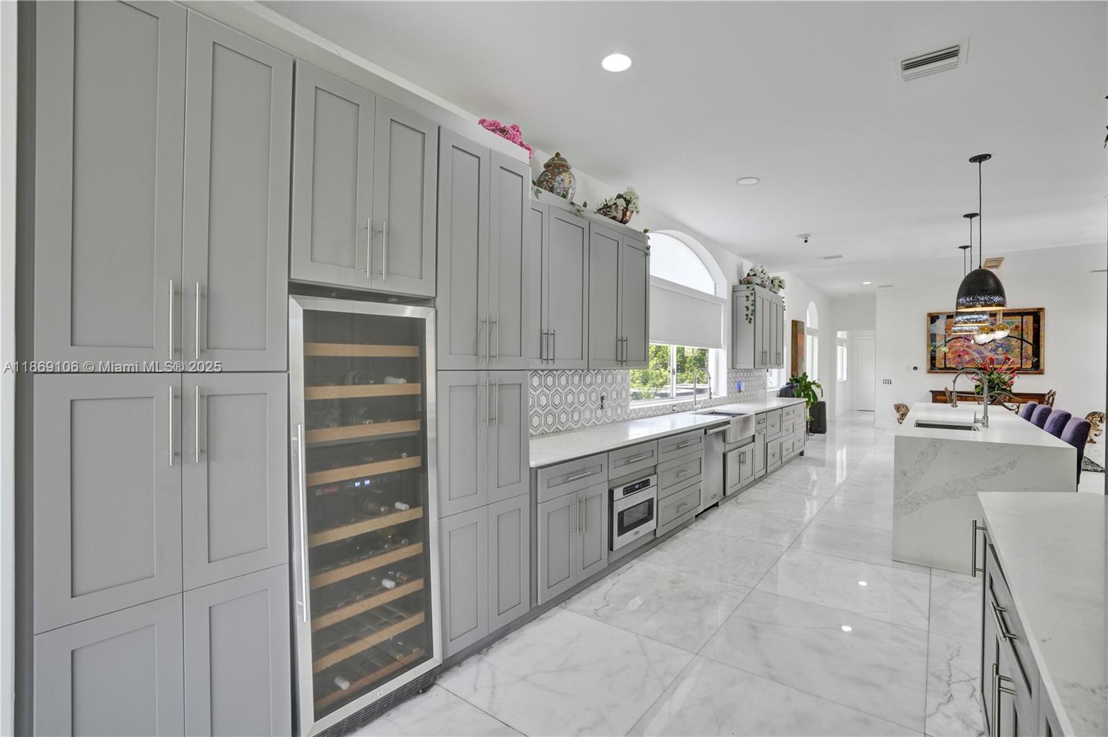 2691 Southwest 139th Terrace Davie, FL 33330 - Photo 25 of 55 a large kitchen with cabinets