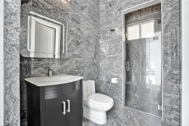 a bedroom with a bed and a table