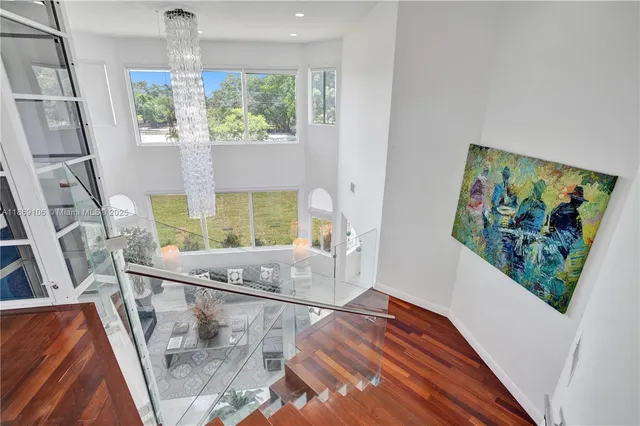 a bathroom with a granite countertop toilet sink and shower