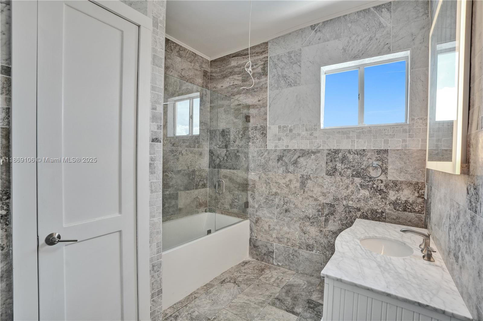 2691 Southwest 139th Terrace Davie, FL 33330 - Photo 49 of 55 a bathroom with a bathtub and a sink