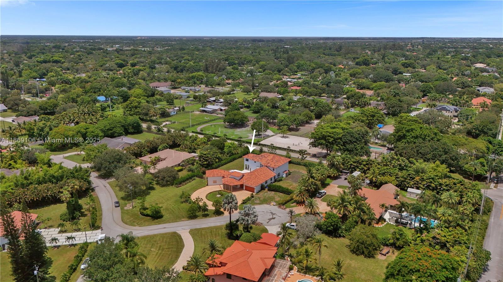 2691 Southwest 139th Terrace Davie, FL 33330 - Photo 53 of 55 an aerial view of residential houses with outdoor space and trees