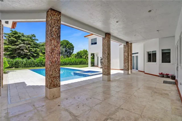 a view of a road with a tree