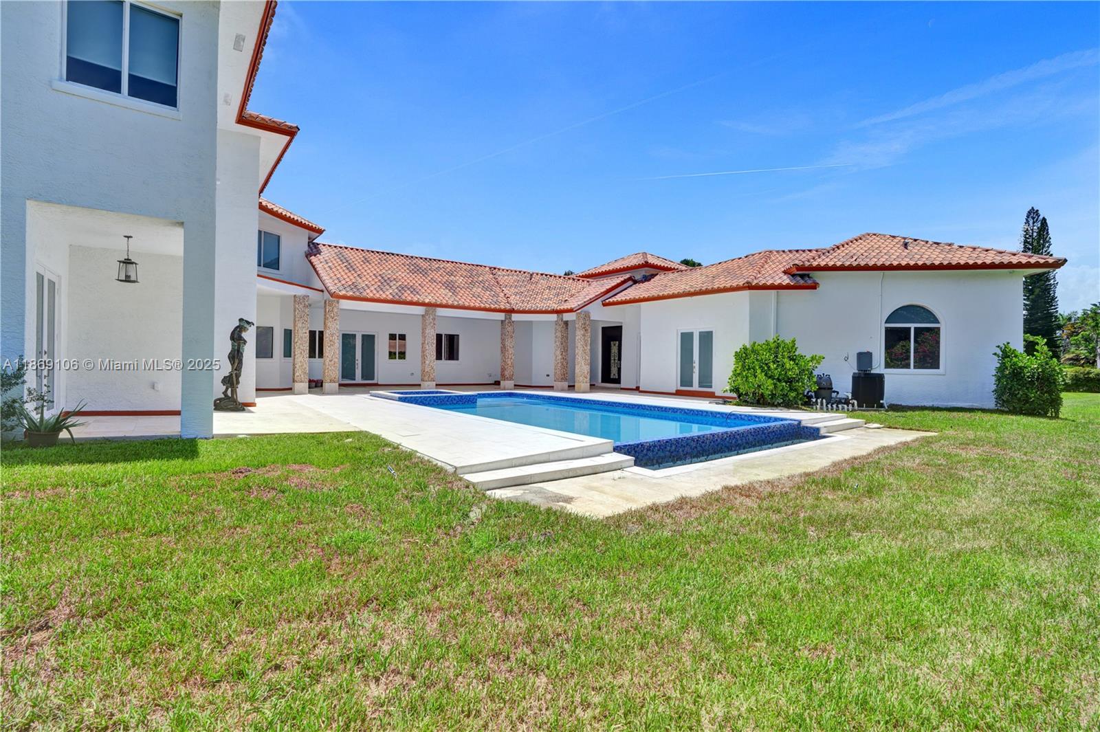2691 Southwest 139th Terrace Davie, FL 33330 - Photo 8 of 55 a view of a house with a yard