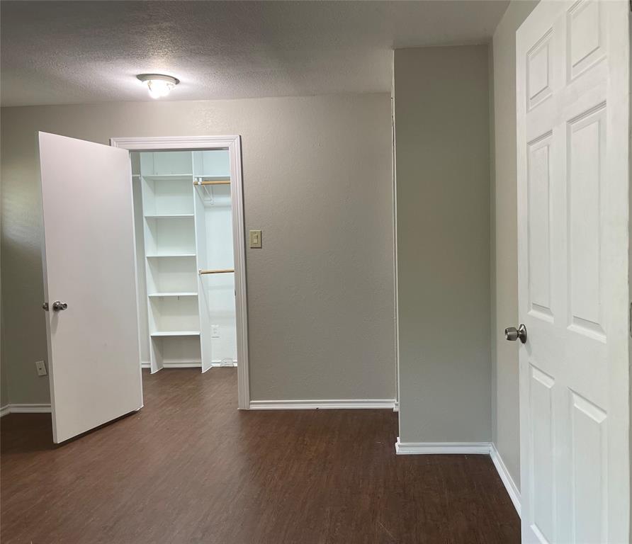 13533 Emeline Street Farmers Branch, TX 75234 - Photo 16 of 29 a view of an empty room with a closet