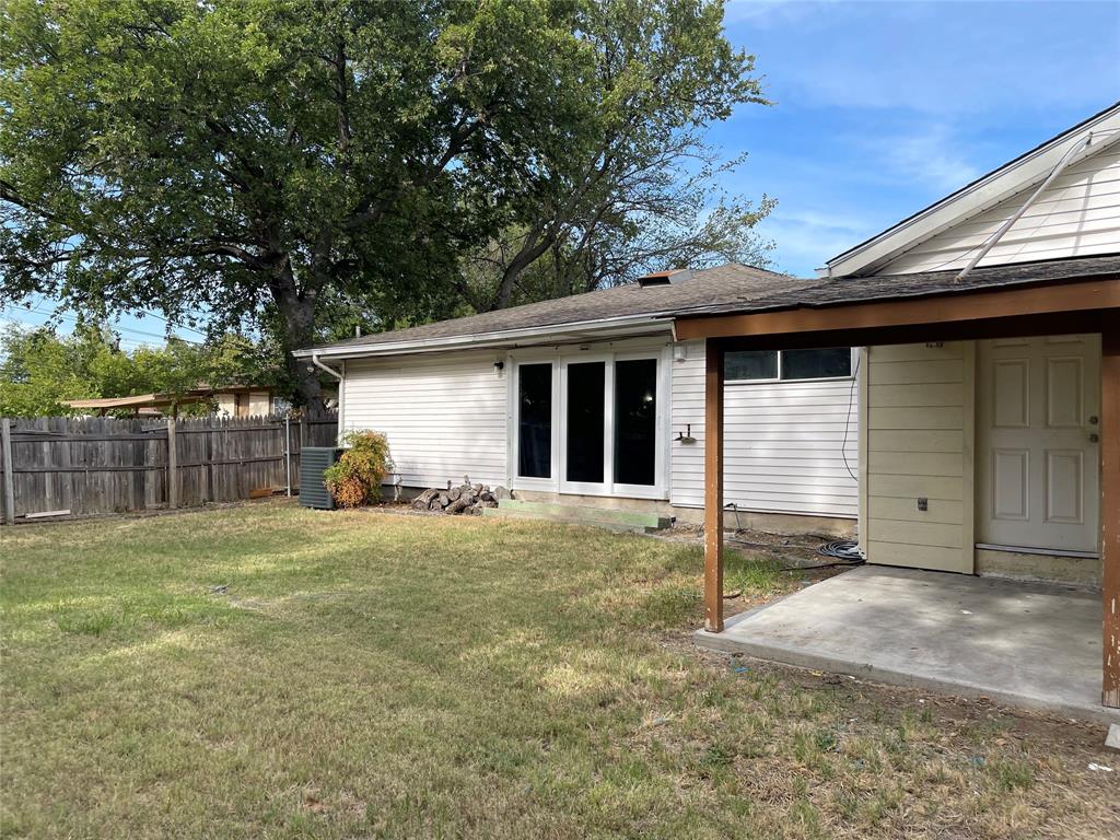13533 Emeline Street Farmers Branch, TX 75234 - Photo 28 of 29 a house that has a tree in front of it