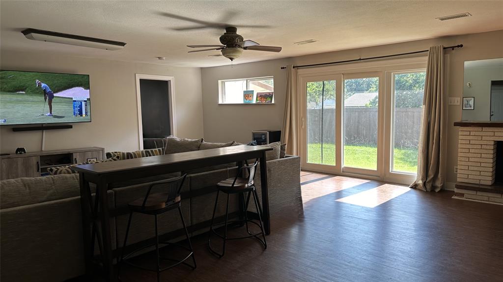 13533 Emeline Street Farmers Branch, TX 75234 - Photo 7 of 29 a view of a workspace with furniture and a window