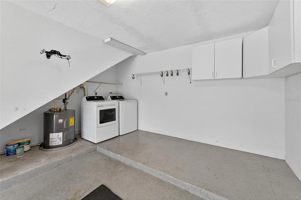 820 Normandy Trace Road Tampa, FL 33602 - Photo 12 of 49 a view of a storage & utility room with a window