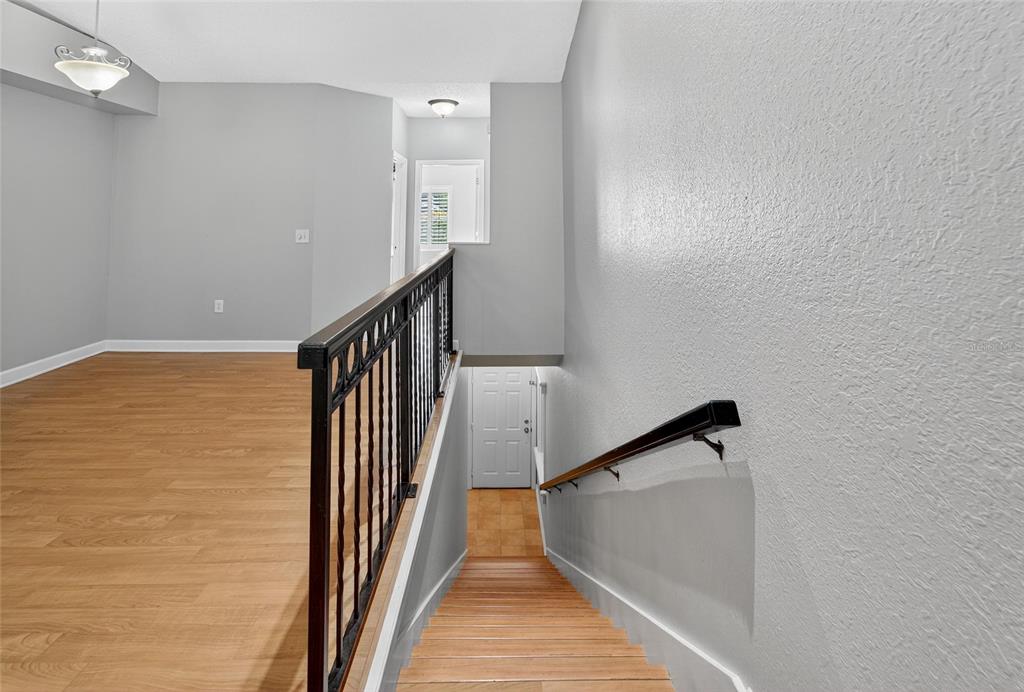 820 Normandy Trace Road Tampa, FL 33602 - Photo 15 of 49 a view of a hallway with staircase