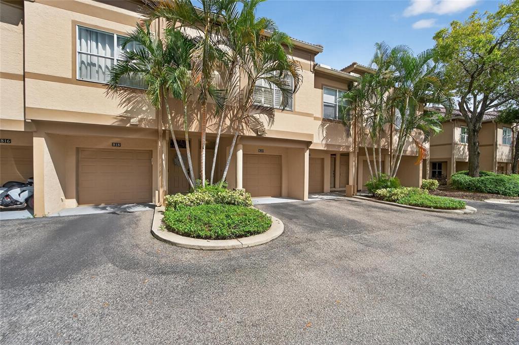820 Normandy Trace Road Tampa, FL 33602 - Photo 2 of 49 front view of a house with a garden