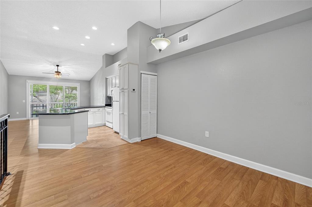 820 Normandy Trace Road Tampa, FL 33602 - Photo 28 of 49 a view of empty room with wooden floor and fan