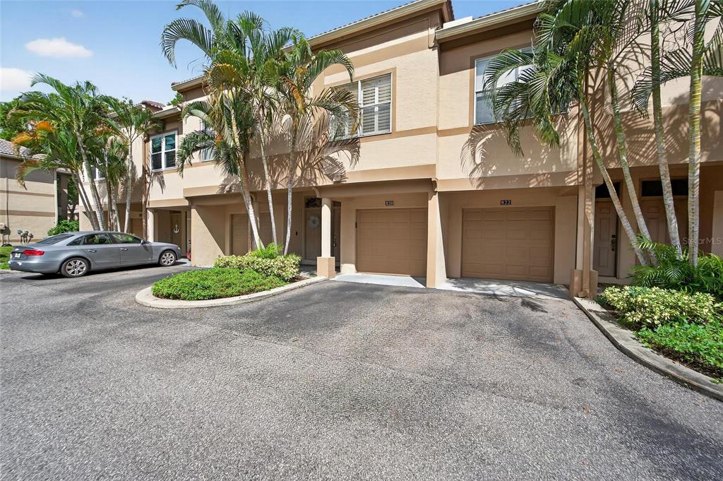 820 Normandy Trace Road Tampa, FL 33602 - Photo 3 of 49 a front view of a house with garden